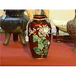 Old, Japanese "pigeon blood" cloisonné enamel ovoid vase with chrysanthemum design on an embossed fo