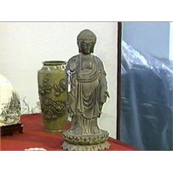Well-detailed, Chinese bronze Buddha in Ming-style with hands held in abhaya and varada mudra, on a 
