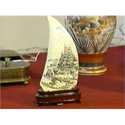 Very elaborately detailed and large, scrimmed whale's tooth with whaling scene (minor split), wood s