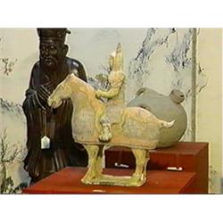Well-detailed, Chinese Wei/Six Dynasties-style painted pottery equestrian (repair to base)
