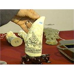 Large and very finely scrimmed, whale's tooth with elaborate whaling scenes on both sides, wood stan