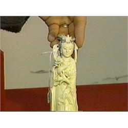 Pair of well-carved, older Chinese ivory figures of beauties holding flowering branches (repair and 