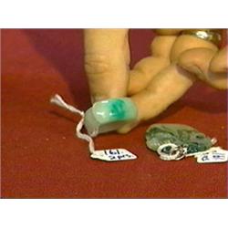 18K gold-mounted, green and rust color jadeite pendant, together with a jadeite saddle ring (color p