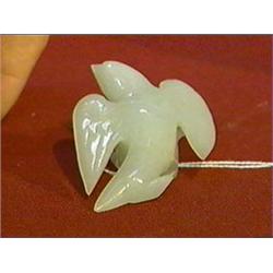 Charming antique Chinese carved celadon jade miniature box in the form of a bird with partially outs