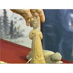 Two Chinese and probably T'ang Dynasty, pottery figures: a court beauty with long sash (repairs); to