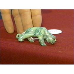 Well-carved, Faberge-style mottled green jade or green garnet model of a stalking tiger, with facete