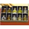 Image 1 : Group of ten, well-hollowed Chinese agate snuff bottles with matching tops, most with carved mask de
