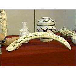 Well-carved and detailed, African ivory tusk/bridge with elephants amid trees design