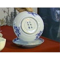Pair of antique, Chinese blue and white porcelain plates with incised lotus and fish and with ruyi f