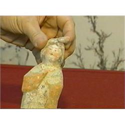 Pair of well-modeled and detailed, Chinese T'ang Dynasty, painted pottery figures of a court beauty 