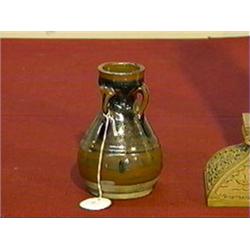 Small and rare, Chinese Sung/Jin Dynasty, brilliantly Honan ware with persimmon-rust color, bottle-f