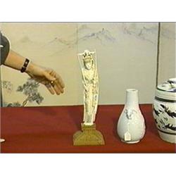Finely carved and detailed, old Chinese ivory figure of a standing empress with elaborate phoenix he