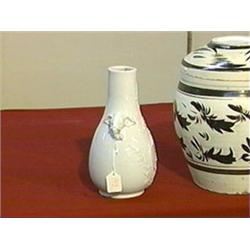 Antique Chinese, Dehua ware bottle vase with well-detailed elephant-head and flowering prunus branch