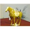 Image 1 : Very finely modeled and with unusually bright amber and straw glaze, Chinese T'ang Dynasty, pottery 