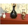Image 1 : Chinese, evenly Honan glazed, bottle vase of good form with iron-rust stylized floral designs, proba