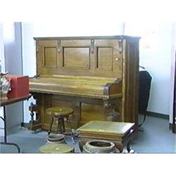 Antique Schubert, upright piano with original ivory keys and well-carved leaf designs, with stool (s