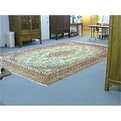 Fine old Persian wool rug, Kerman, approximately 9 1/2' x 13 1/2', floral designs with pale green gr