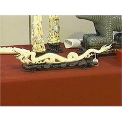 Very finely detailed and quite unusual, older Chinese carved ivory model of a long sinuous dragon (t
