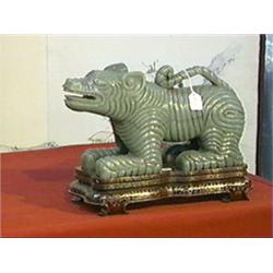 Massive and very unusual, Chinese carved green jade, somewhat archaistic model of a dog on all fours