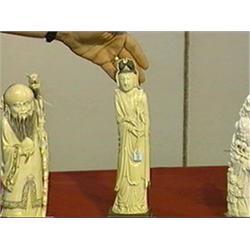 Chinese carved ivory figure of Kwan Yin with hand in expressive gesture and holding a scepter, wood 