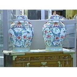 Pair of very large and finely detailed, Chinese Famille Rose enameled porcelain jars and covers with