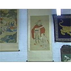 Antique and finely detailed, Chinese ink and color on paper scroll painting of an Immortal or deity 