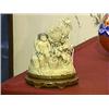 Image 1 : Very elaborately carved and detailed, older Chinese ivory group of a Cultural Revolutionary girl sea