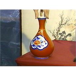 Well-detailed and of fine form, Japanese enameled with underglaze blue, studio porcelain bottle vase