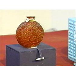 Large and very finely detailed and carved, Chinese red Peking glass snuff bottle with dragons amid w