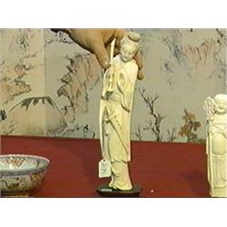 Well carved older Chinese ivory figure of a beauty in long robes with sword and candle, good detaili
