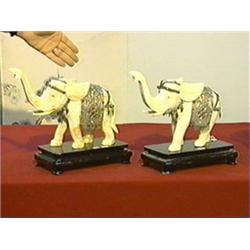 Pair of well-detailed, Chinese bone mosaic models of elephants with repousse, braided and "jeweled" 