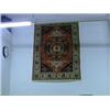Image 1 : Good, Meshgin wool rug with bold red, blue and green stylized floral design, approx. 5 1/2'X 7 1/2'