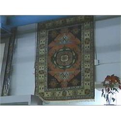 Good, red Meshgin wool rug with stylized scrolling floral designs on a multi-color ground, approx. 4