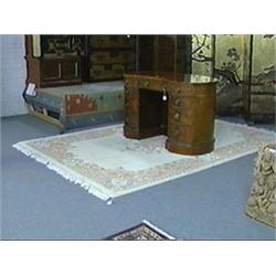 Indian, pastel-color wool rug with "sculpted" floral medallion and floral spray designs on a cream-c