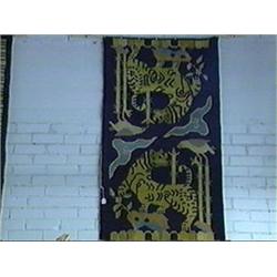 Unusual, old Sino-Tibetan rug with design of tigers and birds (old flaws and wear)