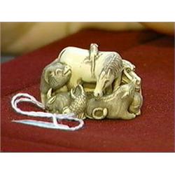 Finely carved and detailed, ivory netsuke of the zodiac animals, signed