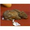 Image 1 : Very finely carved and detailed, carved wood netsuke of a recumbent ox with "rope" attached, signed 