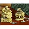 Image 1 : Two carved and lightly polychromed, ivory netsuke: monkey on horseback, signed; and man with gong on