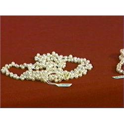 Three-strand cultured pearl necklace with 14K yellow gold beads and clasp