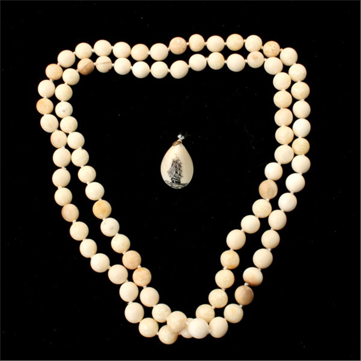 COLLECTION OF TWO IVORY JEWELRY ITEMS.