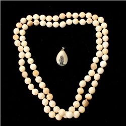 COLLECTION OF TWO IVORY JEWELRY ITEMS.