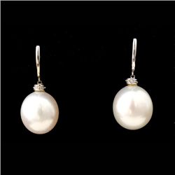 SOUTH SEA CULTURED PEARL, 14K YELLOW GOLD EARRINGS.