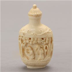 A Carved Ivory Snuff Bottle*