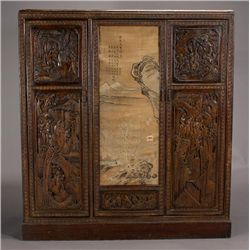 A Large Carved Wood Cabinet