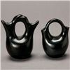 Image 1 : Two miniature blackware double spoutted pitchers
