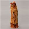 Image 1 : HONYOUTI.  Tall figure carrying an infant.