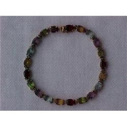 14K GOLD AND MULTI-COLORED STONE BRACELET -