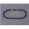 Image 1 : 14K GOLD AND BLUE TOPAZ BRACELET - 8" BRACE