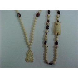 TWO BEADED IVORY NECKLACES - ONE 30 " STRAN
