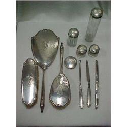 ELEVEN PIECE STERLING SILVER ART DECO VANIT